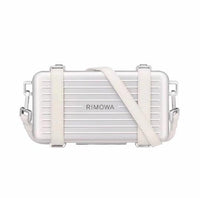 RIMOWA X DIOR